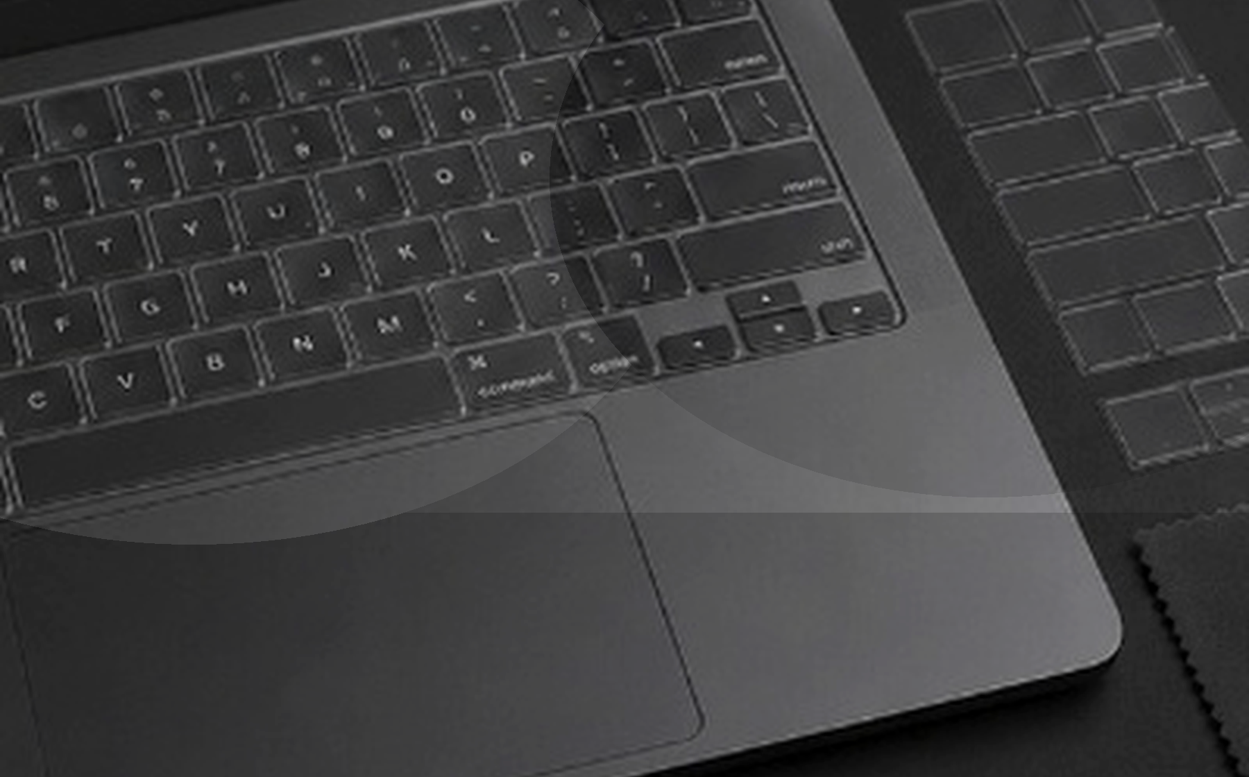 clac starter kit arranged beside a logo-free laptop on a dark desk